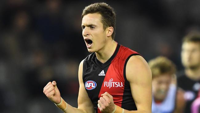 Orazio Fantasia of the Bombers celebrates after kicking a goal.