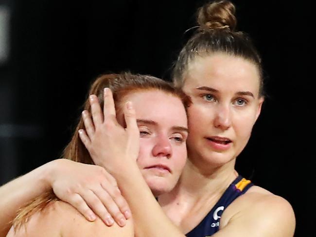 BRISBANE, AUSTRALIA - AUGUST 14: Steph Wood and Mahalia Cassidy of the Lightning look dejected after defeat during the Super Netball Semi-Final match between West Coast Fever and Sunshine Coast Lightning at Nissan Arena, on August 14, 2021, in Brisbane, Australia. (Photo by Jono Searle/Getty Images)