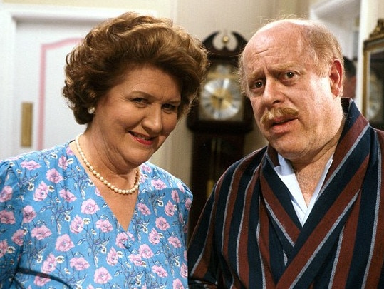 Patricia Routledge as Hyacinth Bucket and Clive Swift as Richard Bucket in the British comedy Keeping up Appearances.