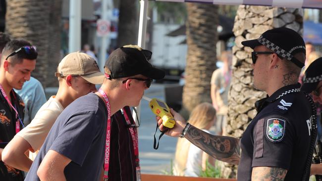 Schoolies are voluntarily breath tested in Surfers Paradise Mall. Picture Glenn Hampson