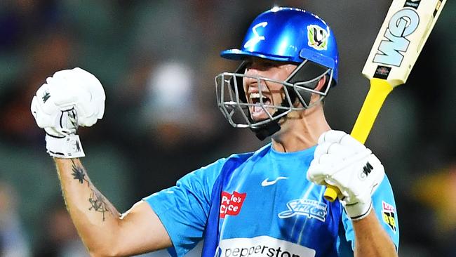 ADELAIDE, AUSTRALIA - JANUARY 05: Matt Short of the Strikers celebrates hitting the winning runs with Colin De Grandhomme of the Strikers during the Men's Big Bash League match between the Adelaide Strikers and the Hobart Hurricanes at Adelaide Oval, on January 05, 2023, in Adelaide, Australia. (Photo by Mark Brake/Getty Images)