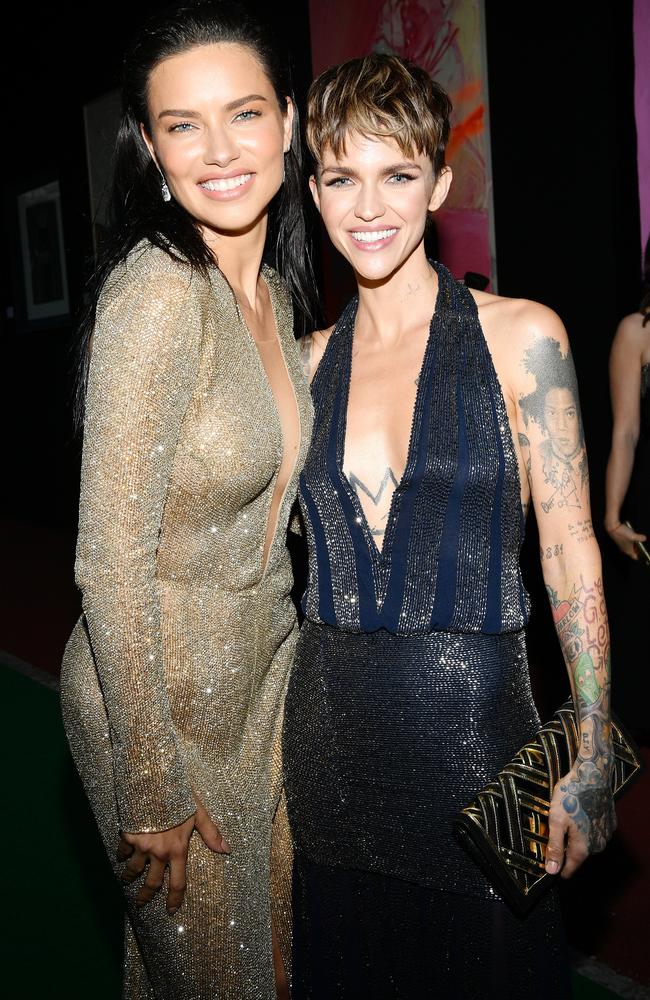 Adriana Lima and Ruby Rose pose for photos inside the gala. Picture: Emma McIntyre/Getty Images for Pernod / amfAR