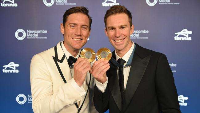 The doubles boys brought their medals out on display on the blue carpet. Picture: Tony Gough