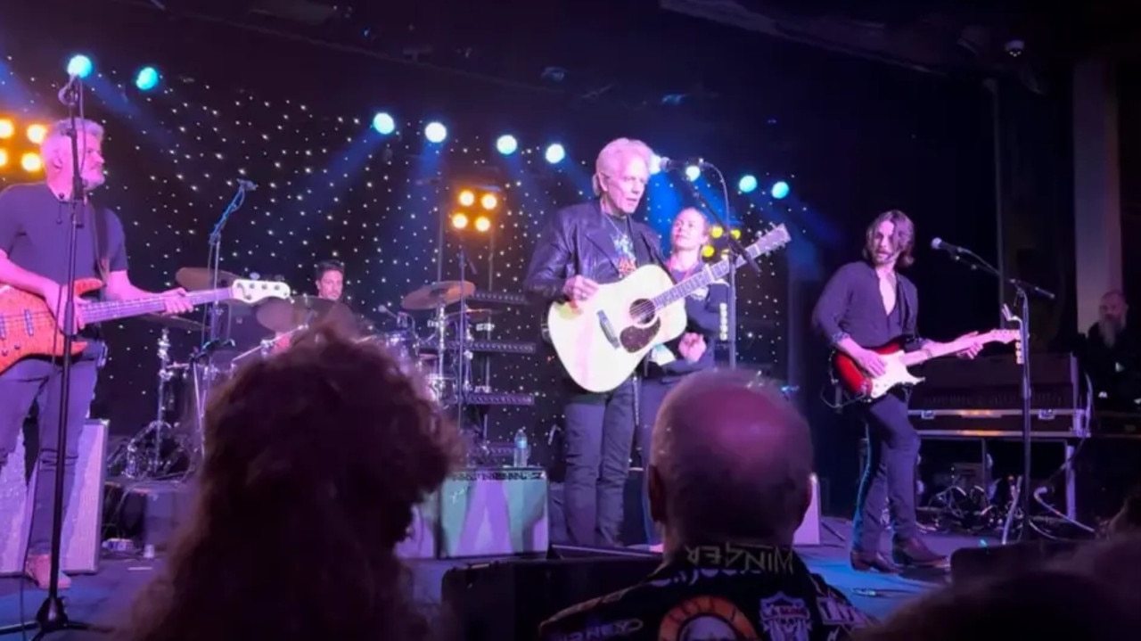 Don Felder had trouble walking as he was led offstage during the performance. Picture: YouTube