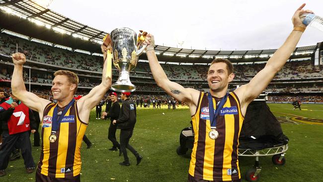 Sam Mitchell and Luke Hodge with the premiership cup in 2013. Picture: Michael Klein