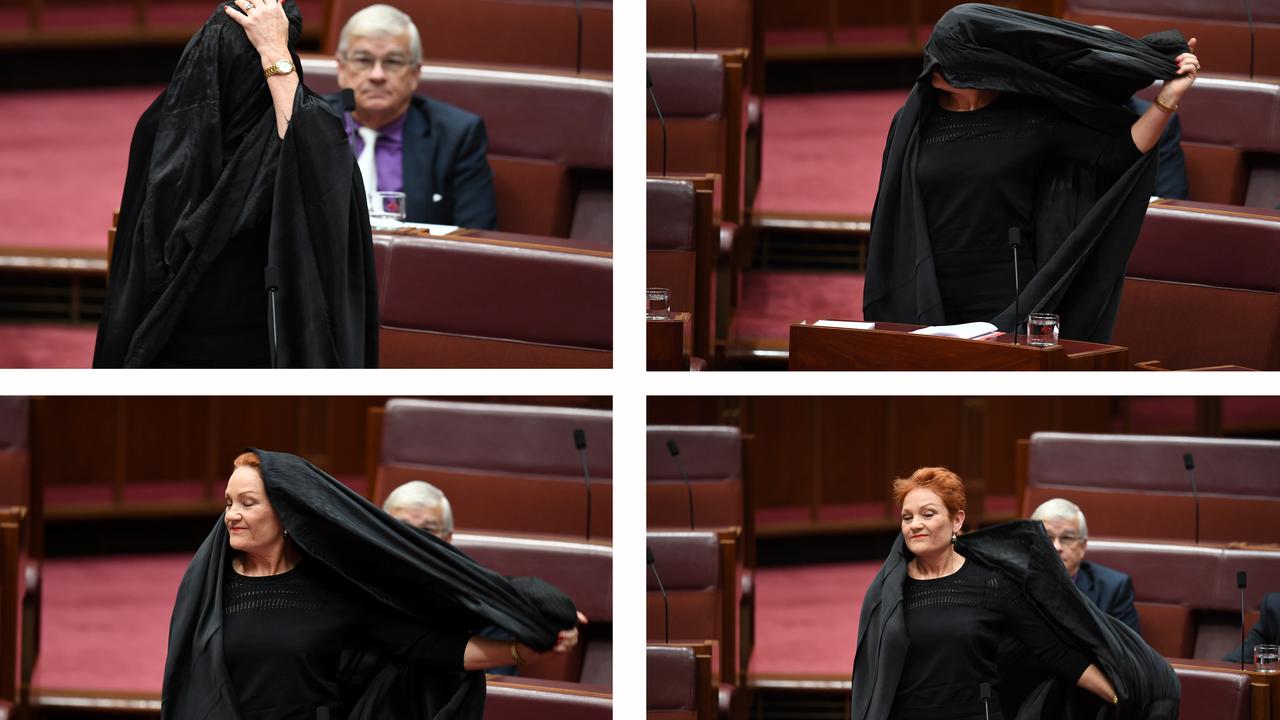 Pauline Hanson wearing a burqa in parliament. Picture: Lukas Coch/AAP