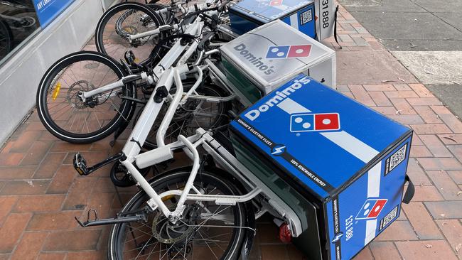 Domino's faces pressure from growing competition, share experts say.