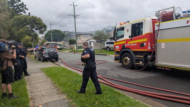 Emergency services rushed to a fire on Nevenia St, Labrador on March 25. The home was destroyed in the inferno, which police believe may have been sparked by a lithium ion battery in an e-bike. Picture: Alex Treacy.