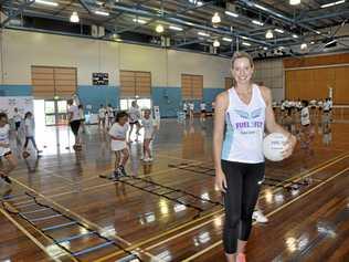 ON COURT: Former Queensland Firebirds and Australian Diamonds star Laura Geitz passed on some of her knowledge to young netballers during the Fuel2Fly netball clinic conducted at St Ursula's College earlier this week. Picture: Alyssa Welke