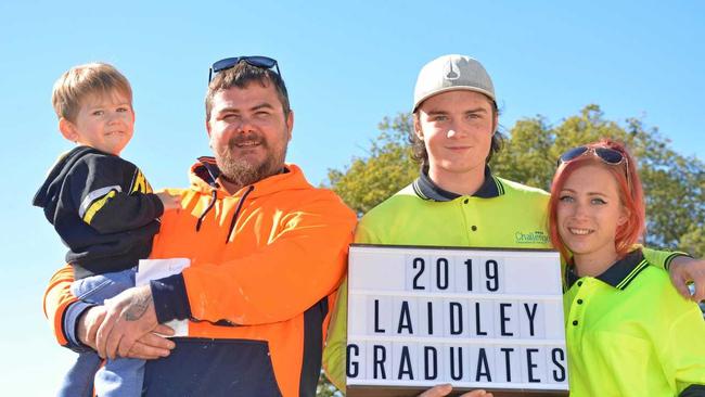 NEXT CHAPTER: Daryl Cowling (with his son), Corey Chance and Kristel graduate from the Laidley Construction Skilling Queenslanders for Work program. Picture: Ebony Graveur