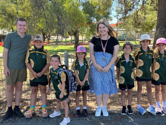 Assistant Principal Joshua Crispin and his wife and fellow teacher Abbey Barcham with some of their students from Menindee Central School. Picture: Supplied