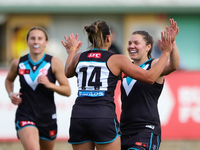 ADELAIDE, AUSTRALIA - AUG 18: Justine Mules-Robinson of the Power celebrates a goal with Kirsty Lamb during the 2024 AFLW Practice Match between the Port Adelaide Power and the Melbourne Demons at Alberton Oval on August 18, 2024 in Adelaide, Australia. (Photo by Sarah Reed/AFL Photos via Getty Images)