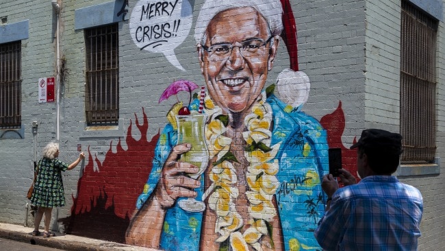 A mural by artist Scott Marsh depicting Prime Minister Scott Morrison on holiday in Hawaii is seen on December 26, 2019 in Sydney. Picture: Jenny Evans/Getty Images