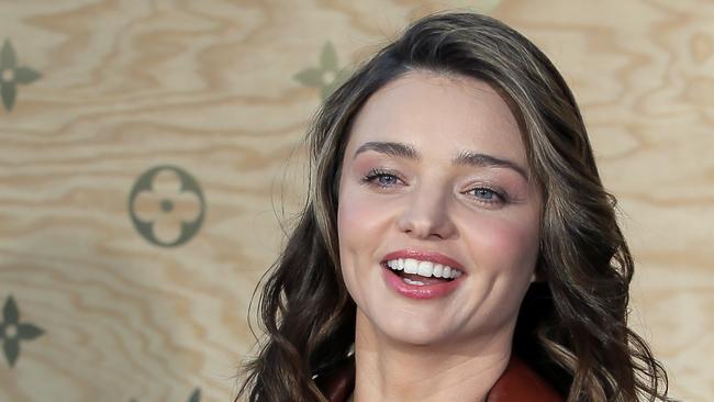 Miranda Kerr goes solo in city of love for Louis Vuitton show | The ...