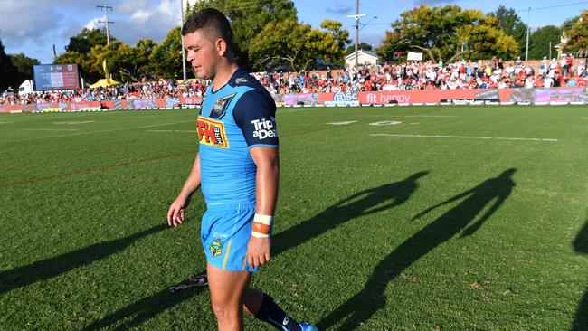 Ashley Taylor walks off after the Dragons rout. (AAP Image/Darren England)