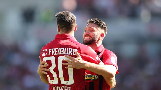 Brandon Borrello (right) celebrates with Freiburg teammate Christian Gunter. Picture: Getty Images