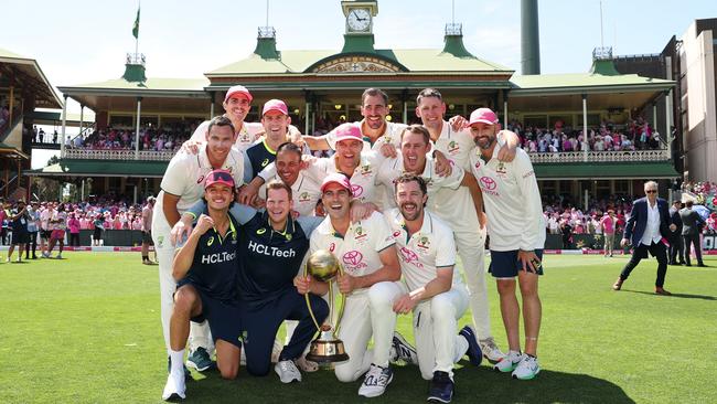 Australia celebrates with the regained Border-Gavaskar trophy after defeating India by six wickets at the SCG on Sunday to complete a 3-1 series victory. Picture: Getty Images