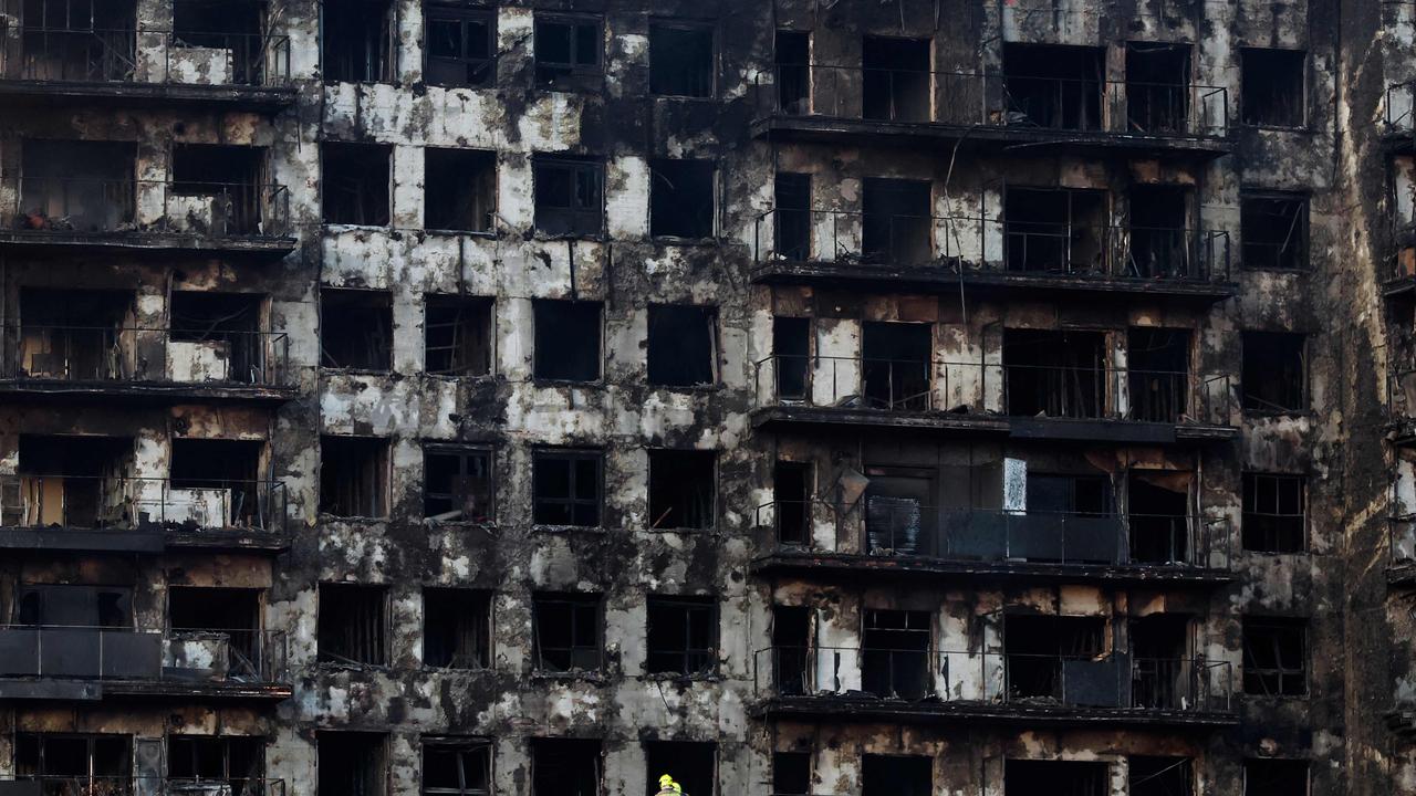 The fire revived memories of London’s Grenfell fire tragedy. (Photo by JOSE JORDAN / AFP)