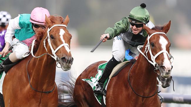 Jye McNeil celebrates as Kings Will Dream wins the Turnbull Stakes. Picture: Michael Klein.