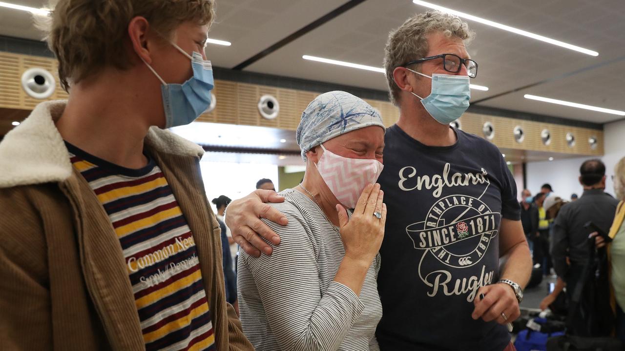 Kate Robertson who has been diagnosed with terminal cancer with son Noah and partner Nic Robertson waiting to meet her parents and two sisters who were arriving from the United Kingdom to see each other after 3 1/2 years. Picture: Nikki Davis-Jones