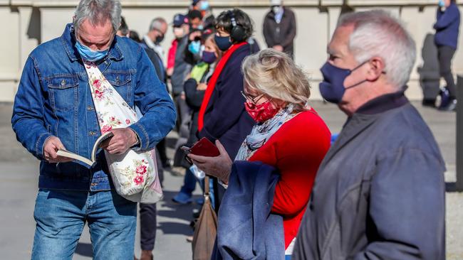 People line up at a vaccination centre in Melbourne. Picture: Tim Carrafa