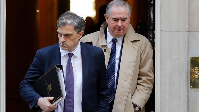 Tory chief whip Julian Smith leaves Downing Street with Attorney-General Geoffrey Cox yesterday. Picture: AFP