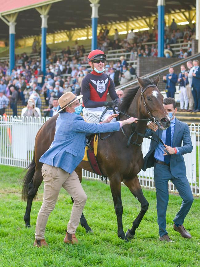 Jockey Ben Thompson brings 10 Purrfect Deal back to scale after winning the 2021 Grafton Cup at the Clarence River Jockey Club July Carnival.