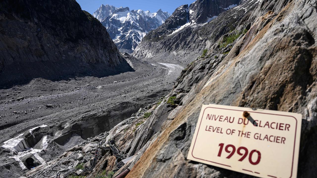 The board indicating the level of the Mer de Glace glacier in 1990 pictured in June, 2019. Photo: Marco Bertorello/AFP