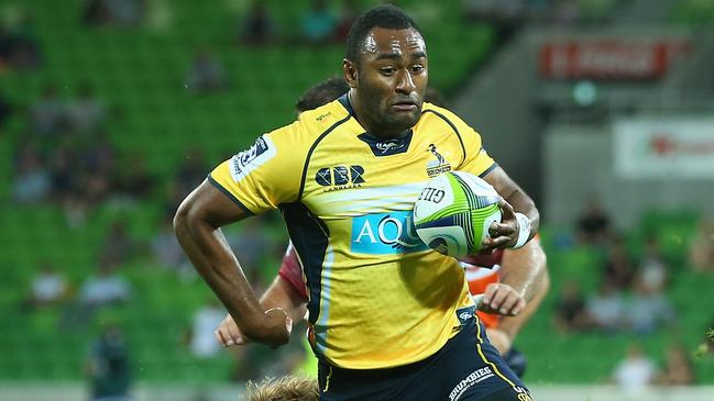 MELBOURNE, AUSTRALIA - FEBRUARY 28: Tevita Kuridrani of the Brumbies breaks through a tackle to score a try during the round three Super Rugby match between the Rebels and the Brumbies at AAMI Park on February 28, 2015 in Melbourne, Australia. (Photo by Quinn Rooney/Getty Images)