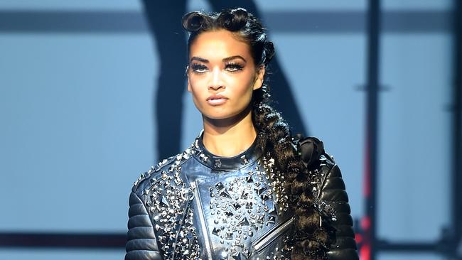 Good girl goes bad: Aussie model Shanina Shaik took on a whole new look with a dramatic hair extension, walking for Philipp Plein. Picture: Dimitrios Kambouris/Getty Images