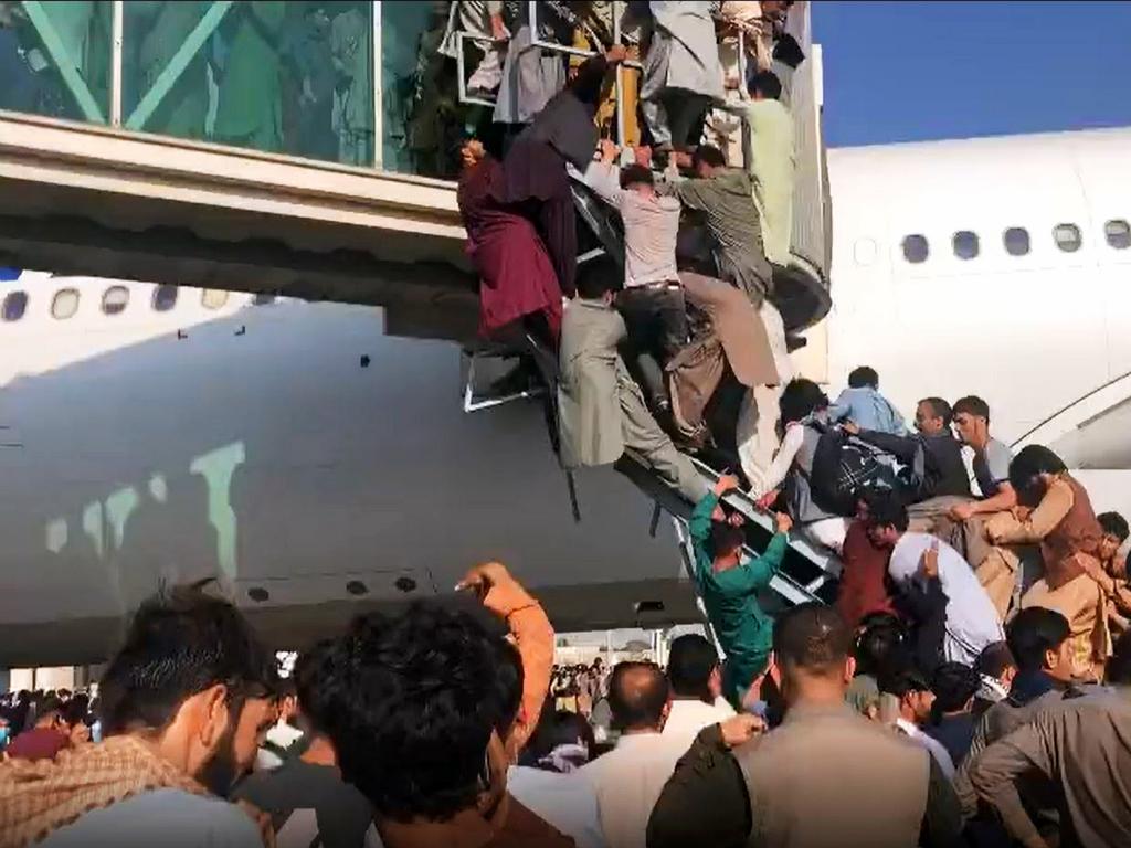 Afghan civilians are desperately trying to flee Kabul to escape the Taliban.