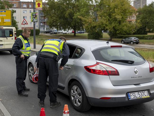 FRANKFURT (ODER), GERMANY - SEPTEMBER 10: German federal police check cars arriving at the German-Polish border on September 10, 2024 in Frankfurt an der Oder, Germany. German Interior Minister Nancy Faeser announced yesterday that Germany will widen its police monitoring to all of its border crossings to stop irregular immigration. Immigrants arriving to seek asylum will be turned away with the directive to seek asylum in the country they are crossing from. Germany's leading political parties are negotiating new legislation to stem irregular immigration following a terror attack by a Syrian man in the town of Solingen recently that left three people dead. Many local communities claim they have already taken in more migrants over recent years than they have the resources to house and integrate. (Photo by Maja Hitij/Getty Images)