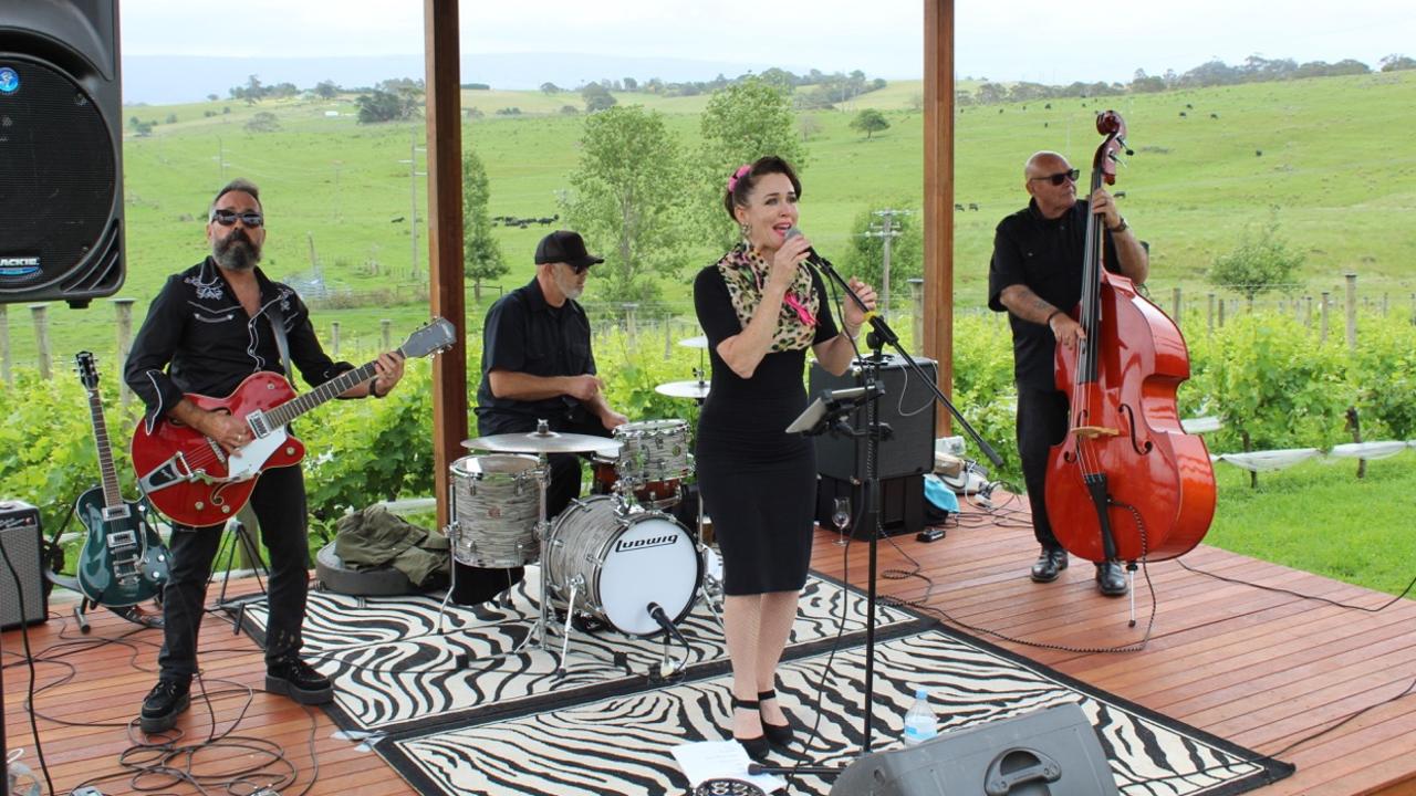 Minnie and The Moonrakers lead guitarist, Gregory Powell, left, with drummer Ken Holm, lead singer Siobhan O'Brien, and bassist Steven Hladio OAM. Picture: Supplied