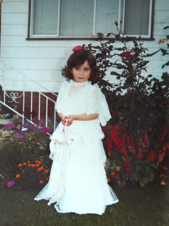 A young Gordana Kotevski, dressed as a flowergirl for a family wedding. Picture: Supplied.