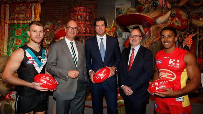 Port Adelaide star Robbie Gray and president David Koch with AFL CEO Gillon McLachlan and Gold Coast chairman Tony Cochrane and midfielder Touk Miller.