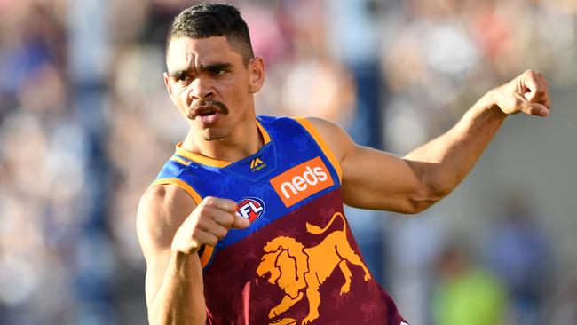 Charlie Cameron of the Lions celebrates kicking a goal during the Round 22 AFL match between the Brisbane Lions and the Geelong Cats.