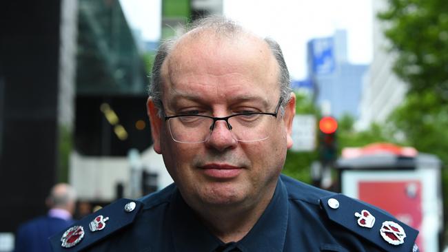 Victoria Police Chief Commissioner Graham Ashton arrives to the royal commission on Tuesday. Picture: AAP