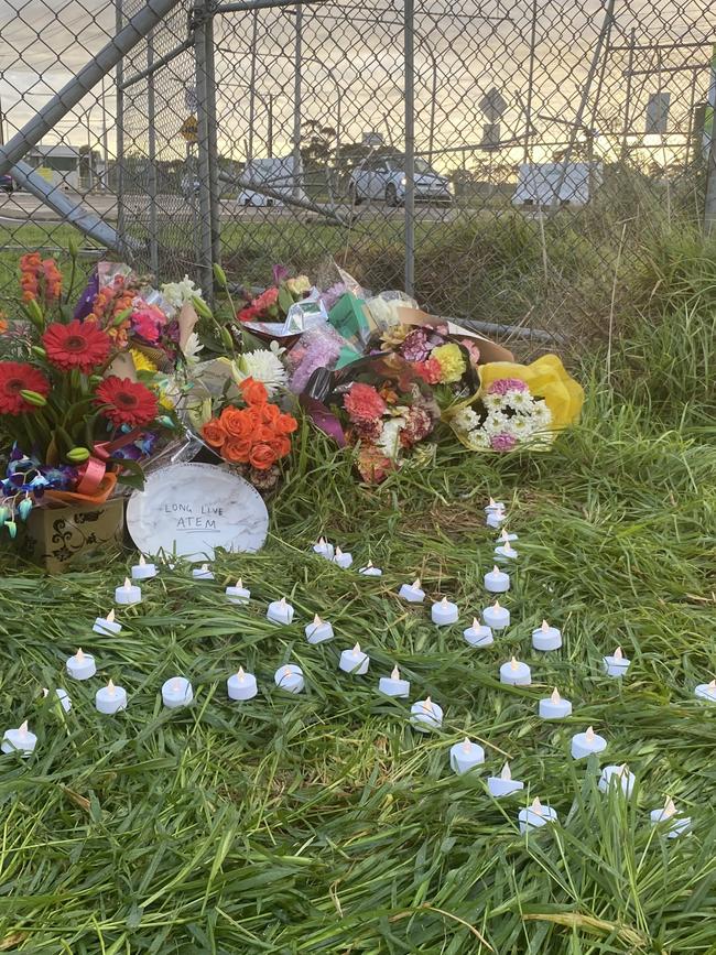 Floral tributes left at the scene of a fatal car crash at Edinburgh RAAF base. Picture: Todd Lewis