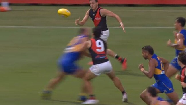 Eagle Will Schofield lays a late bump on Bomber Dylan Shiel during Thursday night’s Marsh Cup clash.