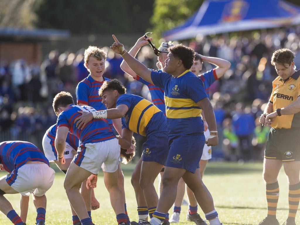 Jeremiah Sialau of Grammar gestures at the full-time siren.