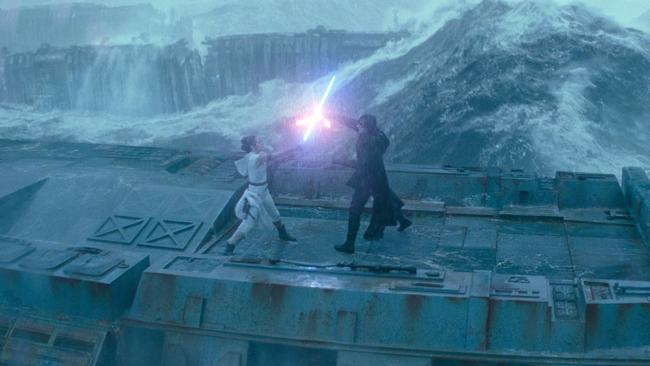 Rey (Daisy Ridley) and Kylo Ren (Adam Driver) battle it out in Star Wars: The Rise Of Skywalker.