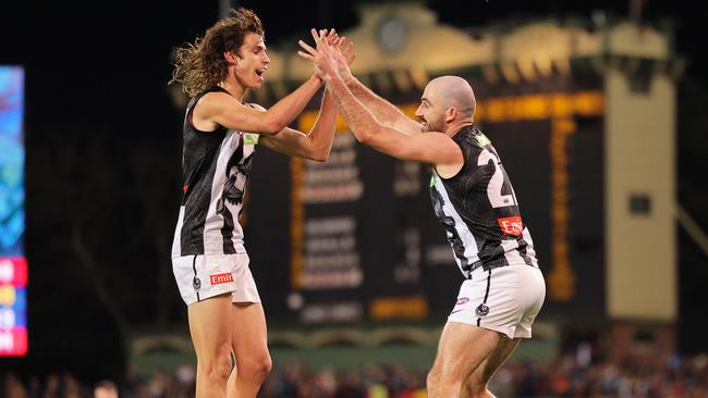 Caleb Poulter and Steele Sidebottom celebrate a goal. Picture: Daniel Kalisz/Getty Images