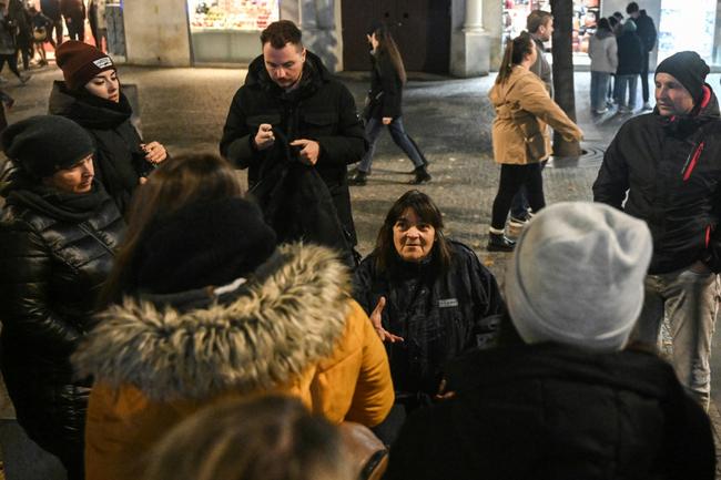 Every Friday, sex worker Lada (R) shows tourists around the Czech capital's underworld