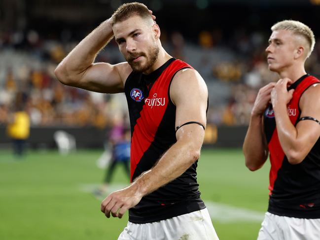 Ben McKay walks off after the Bombers’ Friday night loss. Picture: Michael Willson/AFL Photos via Getty Images.