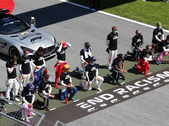 Some of the F1 drivers take a knee on the grid in support of the Black Lives Matter movement ahead of the Formula One Grand Prix of Austria. (Photo by Peter Fox/Getty Images)