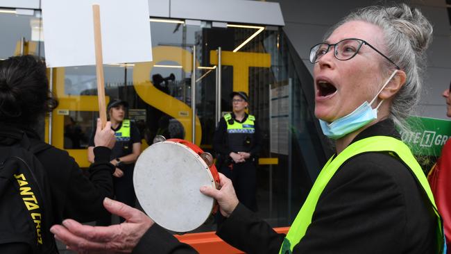 Anna Slynn protesting at the Convention Centre, Adelaide, on Tuesday. Picture: Tricia Watkinson