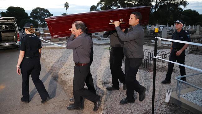 Adelaide Cemetery Authority pallbearers carry the remains of the Somerton Man at West Terrace Cemetery, Adelaide. Picture: NCA NewsWire / David Mariuz