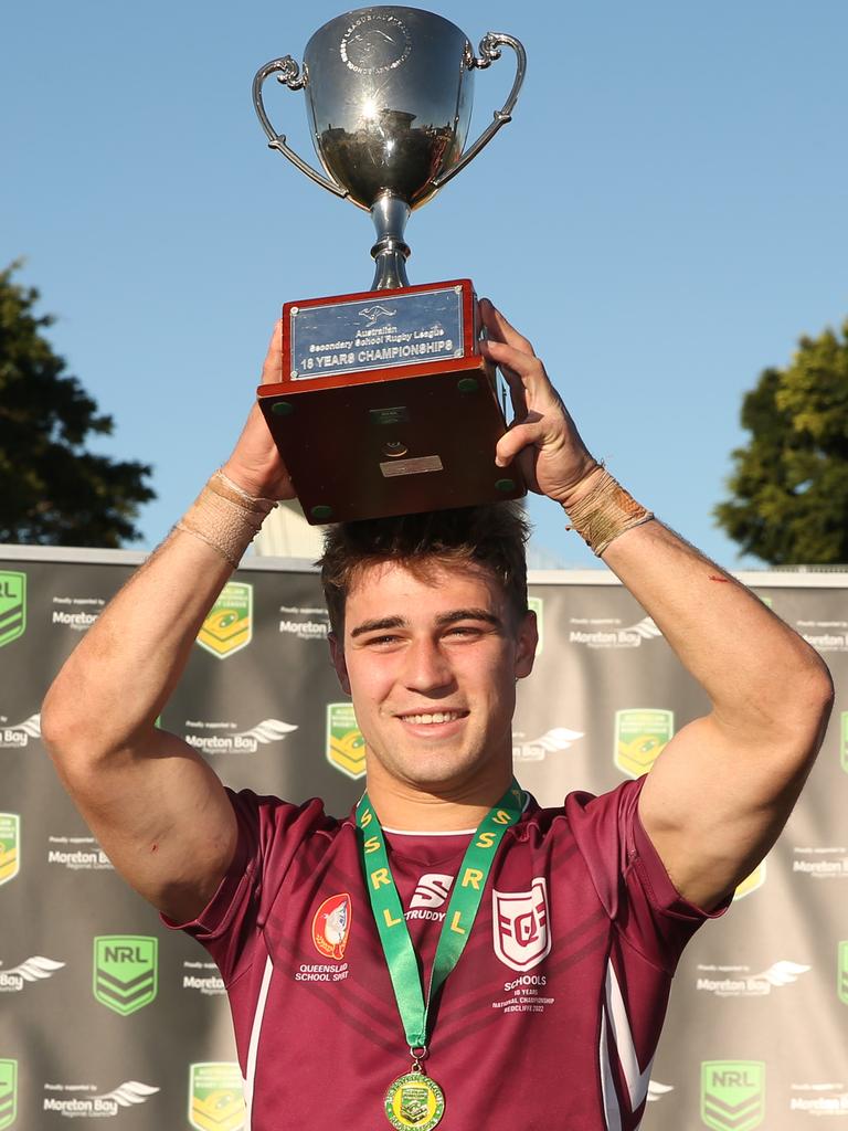 QLD captain Jye Gray lifts the championship trophy after QLD won the under 18 ASSRL schoolboy rugby league championship grand final between QLD v NSW CHS from Moreton Daily Stadium, Redcliffe. Picture: Zak Simmonds