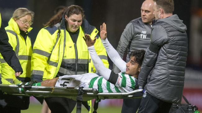 CelticÕs Daniel Arzani goes off injured during the Scottish Premiership match at Dens Park, Dundee. Picture date: Wednesday October 31, 2018. See PA story SOCCER Dundee. Photo credit should read: Jeff Holmes/PA Wire. EDITORIAL USE ONLY