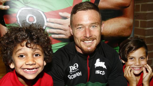 Darlington Public School students Ditchu Winters, 7 and Kian Walhers, 8, meet South Sydney Rabbitohs player Damien Cook on Wednesday to learn about caring for their teeth. Picture: John Appleyard